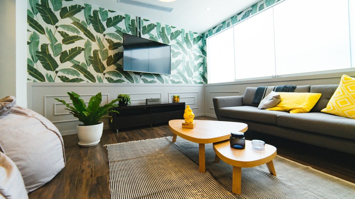 Modern living room with botanical wall paper 