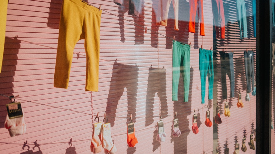 Bright colored pants hung from clothing line- Who Who Carpet Cleaning Blog 