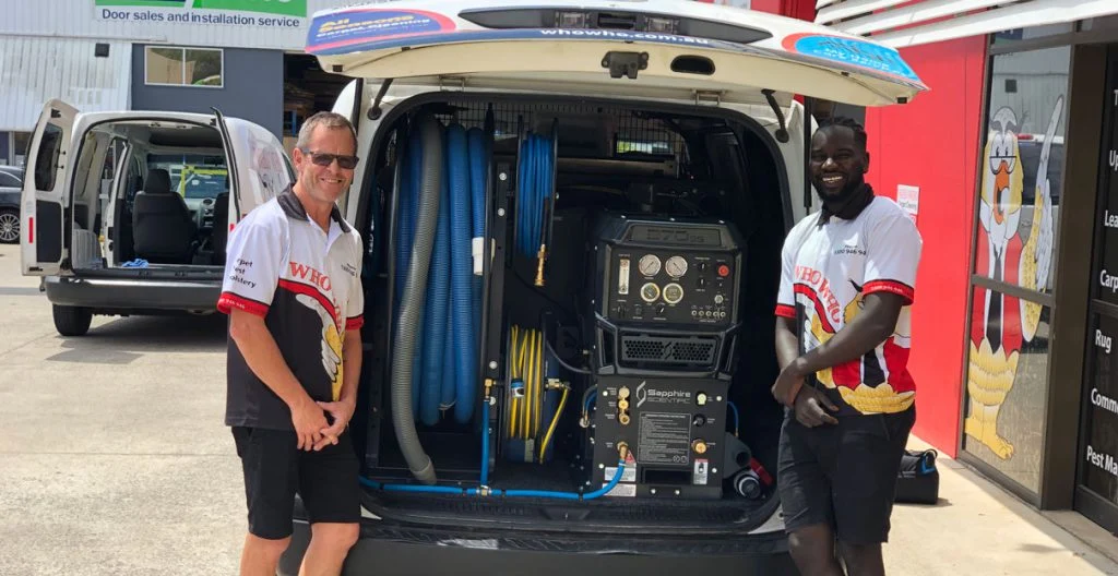 ww employees Who Who Carpet Cleaning Technicians standing next to high quality carpet cleaning technology in Brisbane
